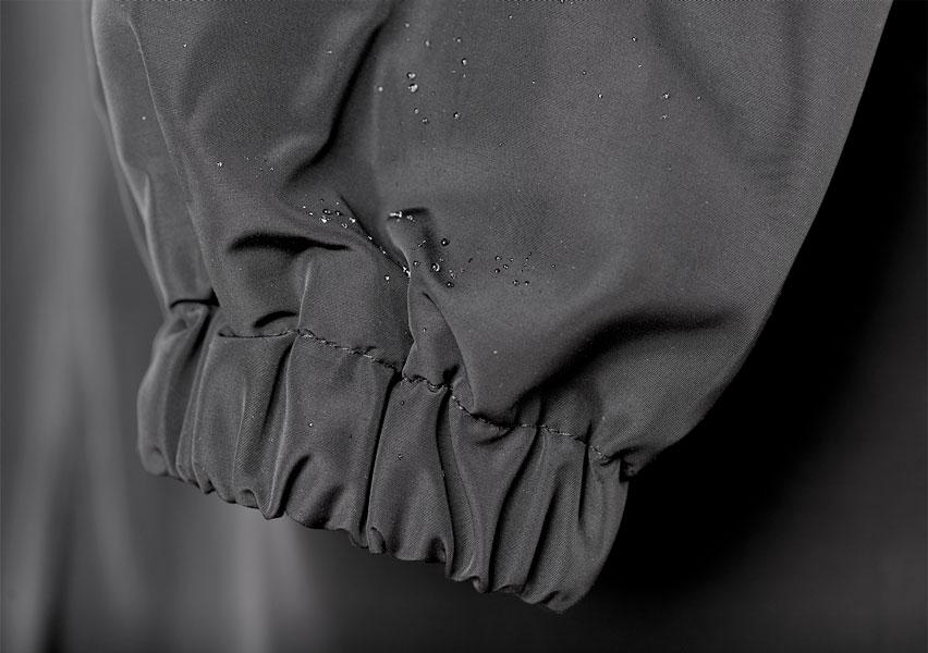 Women's Hooded Long Rain Jacket in Pink - alternate angle showing fit and fabric detail