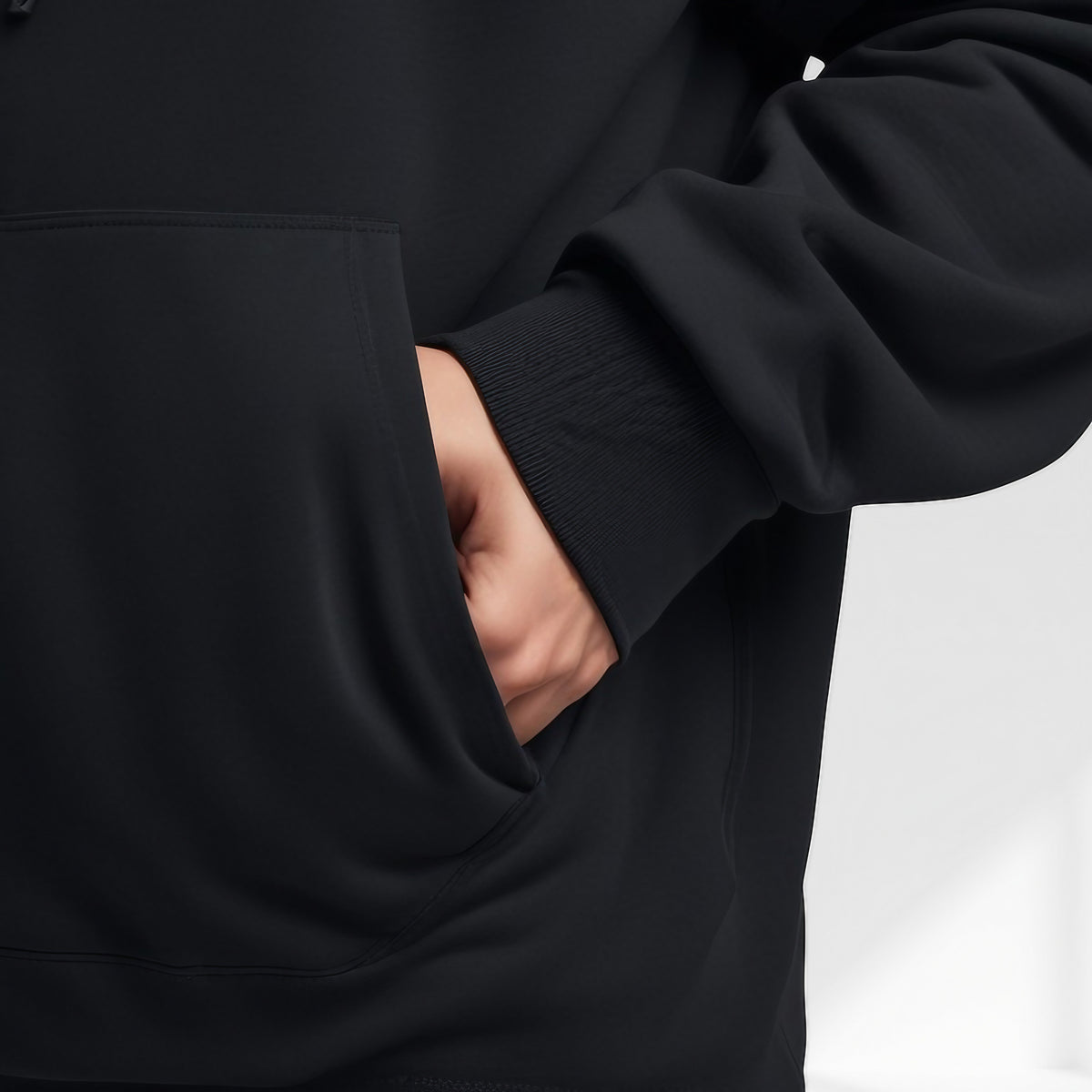 Men's Oversized Pullover Hoodie in Black - alternate angle showing fit and fabric detail