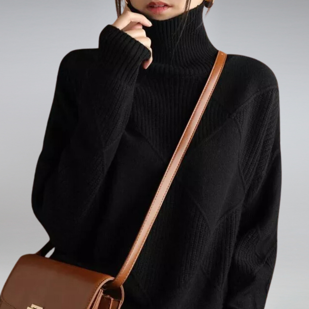 Women's Relaxed Turtleneck Sweater in Black - alternate angle showing fit and fabric detail