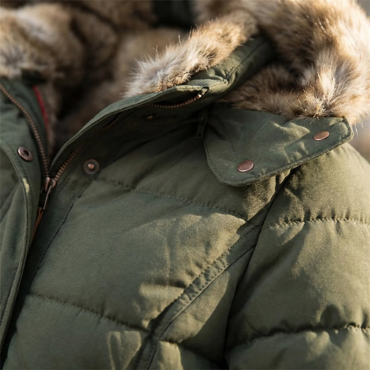 Women's Quilted Winter Jacket with Faux Fur Trim Hood in Green - alternate angle showing fit and fabric detail