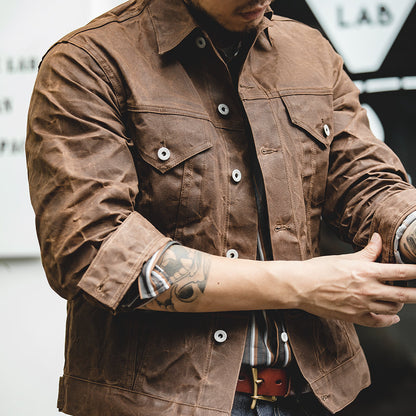 Men's Waxed Canvas Trucker Jacket in Brown - alternate angle showing fit and fabric detail