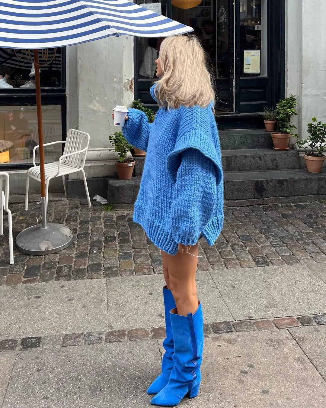 Women's Oversized Chunky Roll Neck Sweater in Blue - alternate angle showing fit and fabric detail
