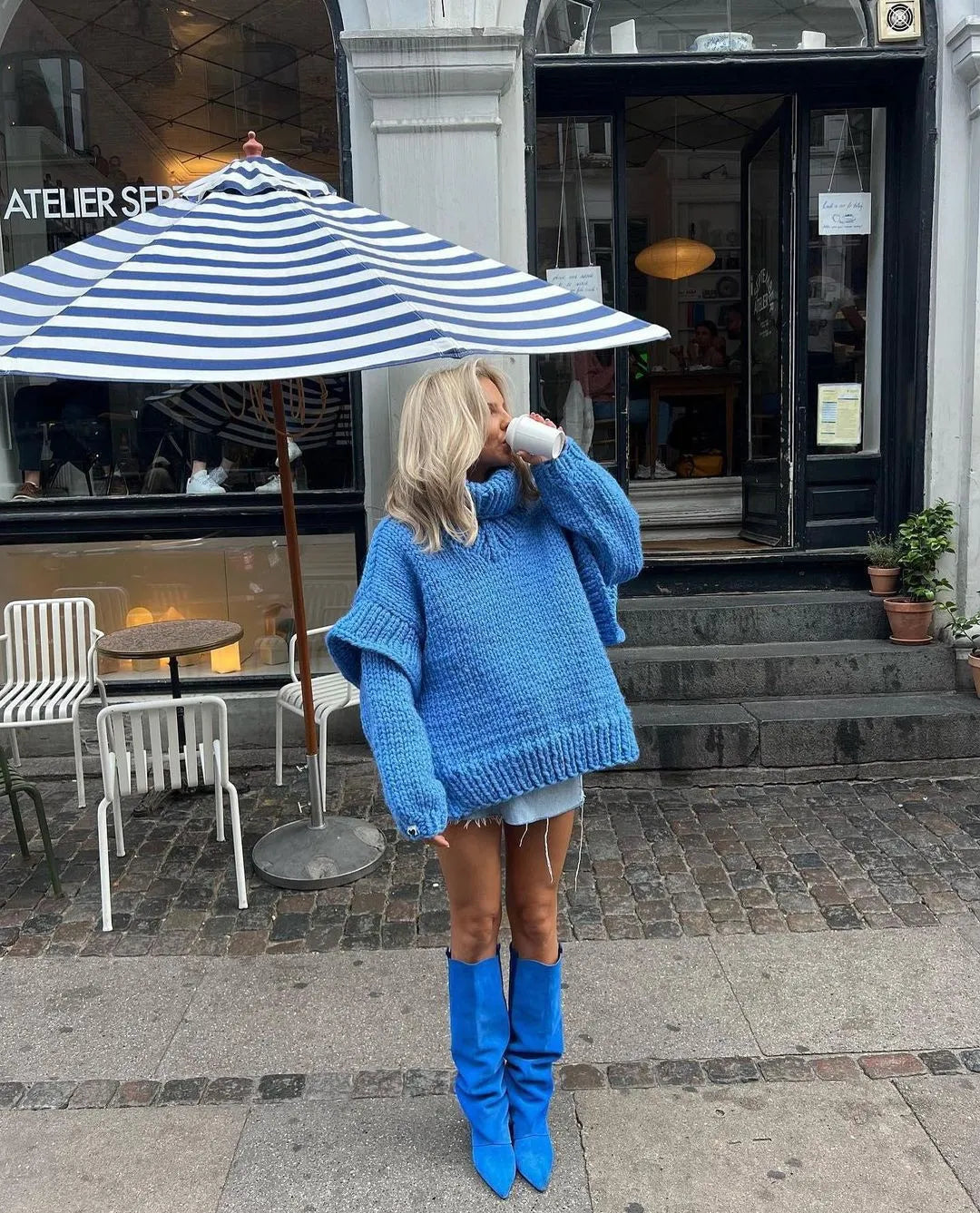 Women's Oversized Chunky Roll Neck Sweater in Blue - alternate angle showing fit and fabric detail