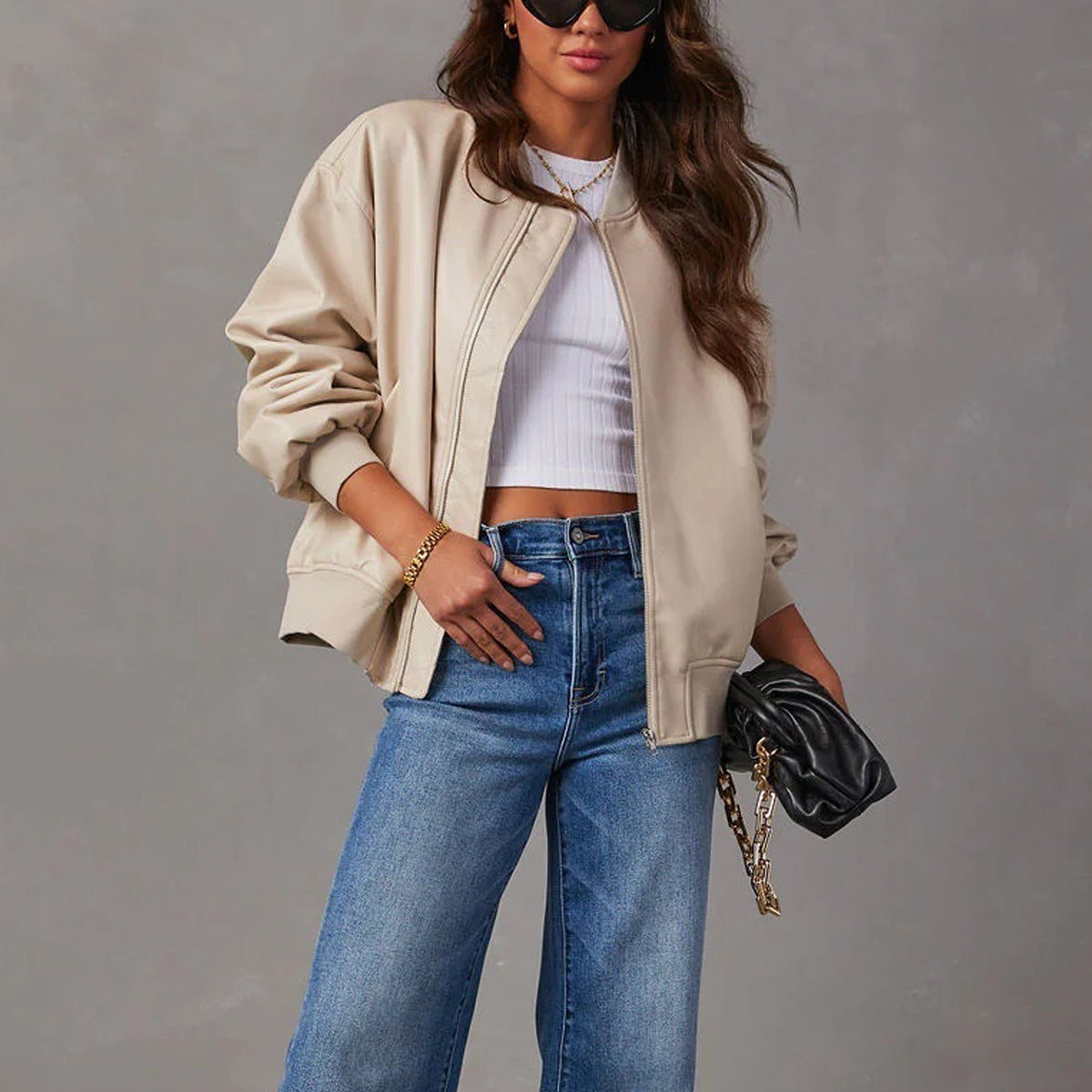 Women's Oversized Faux Leather Bomber Jacket in Black - alternate angle showing fit and fabric detail