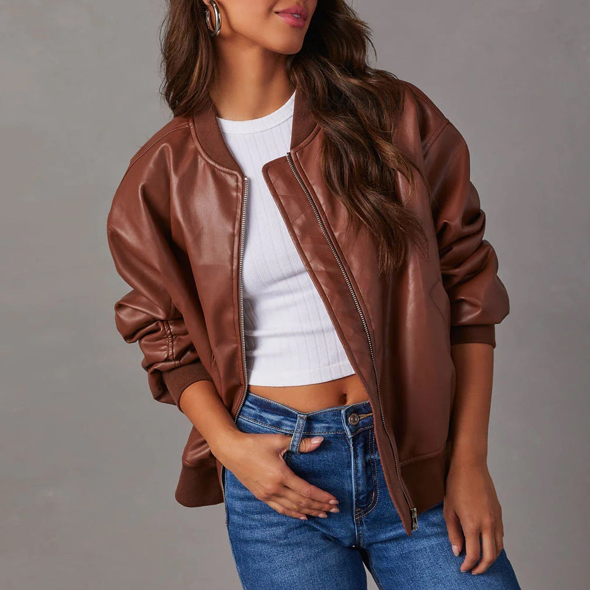 Women's Oversized Faux Leather Bomber Jacket in Black - alternate angle showing fit and fabric detail
