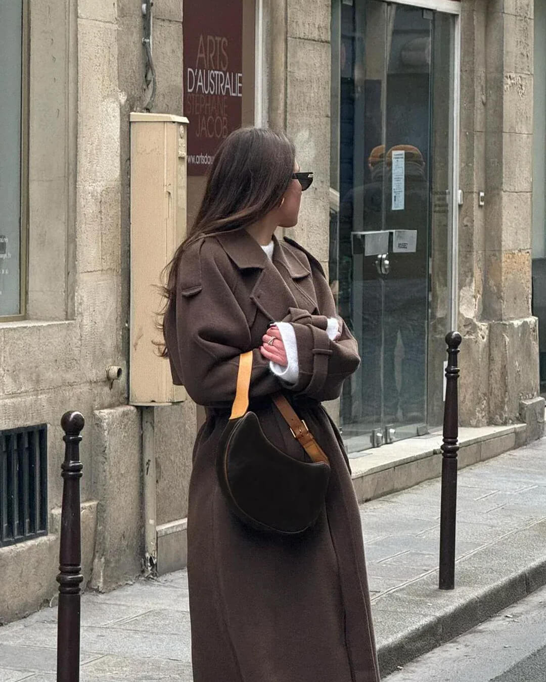 Women's Long Double-Breasted Trench Coat in Brown - alternate angle showing fit and fabric detail
