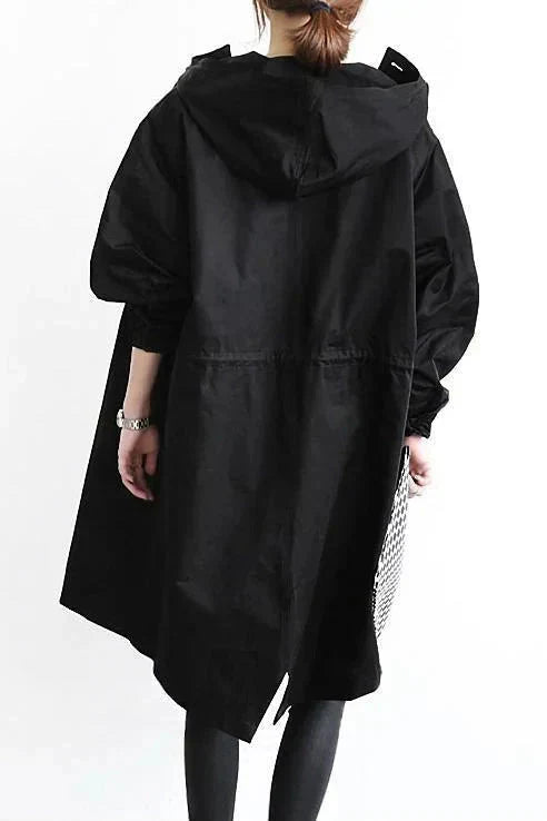 Women's Hooded Long Rain Jacket in Black - alternate angle showing fit and fabric detail