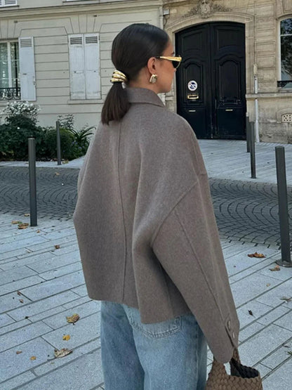 Women's Short Winter Jacket in Taupe - alternate angle showing fit and fabric detail