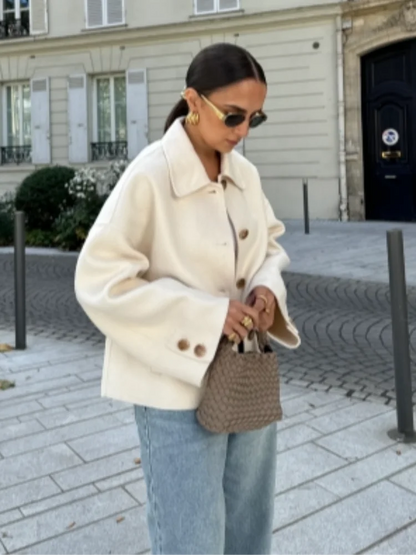 Women's Short Winter Jacket in Cream - alternate angle showing fit and fabric detail