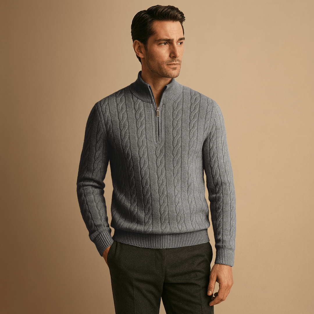 Man wearing a grey cable knit half-zip sweater
