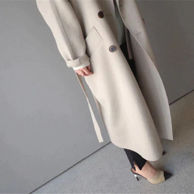 Women's Oversized Double-Breasted Long Coat in Beige - alternate angle showing fit and fabric detail